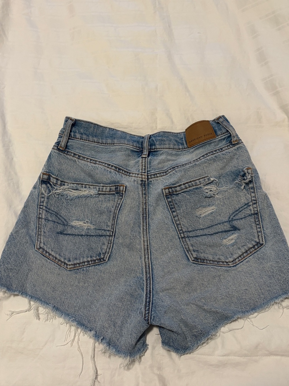 American Eagle high rise Light Wash Ripped Denim Shorts - Picture 3 of 6